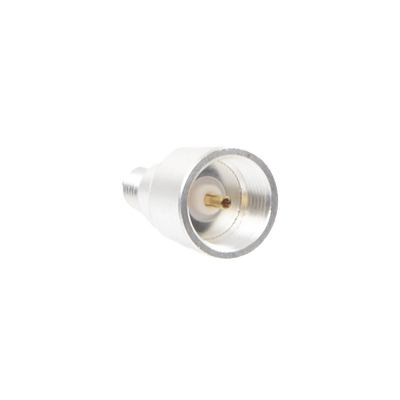 [PT-4000-134] Adaptador UNIDAPT Hembra a SMA Hembra Inverso. Plata / Oro / Teflón.